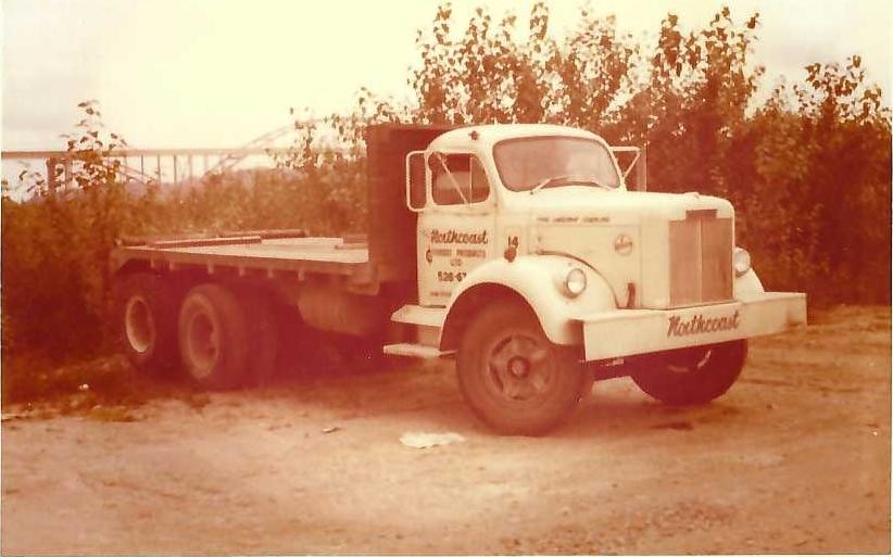 Ludeman Trucking Story begins l965 :Vintage White tandem axle straight truck.